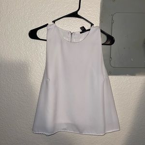 Little blue stain but hardly noticeable! Cute flowey cummerbund shirt!